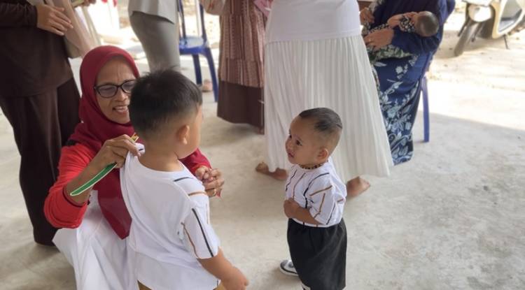 Posyandu Balita dan KKN: Garda Depan Tumbuh Kembang Anak